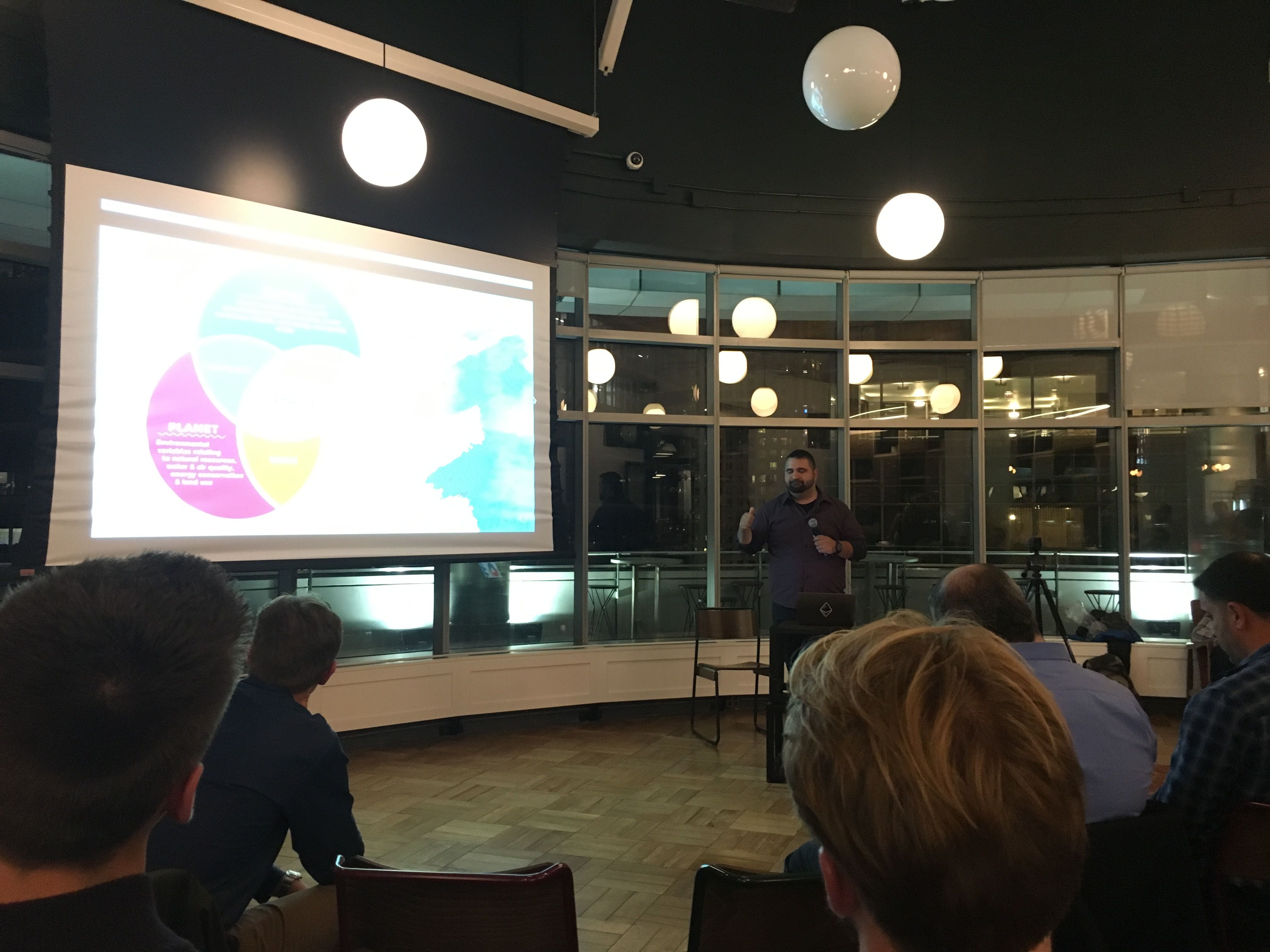Joe Hernandez presenting at an evening event